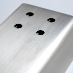 Ground stainless steel sheet metal part