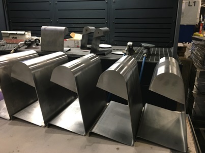 Complex sheet metal fabricated parts made of normal steel bent with a custom tool