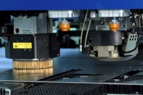 Combined punch-laser sheet metal processing machine