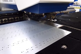 Punching and laser cutting on a combined machine